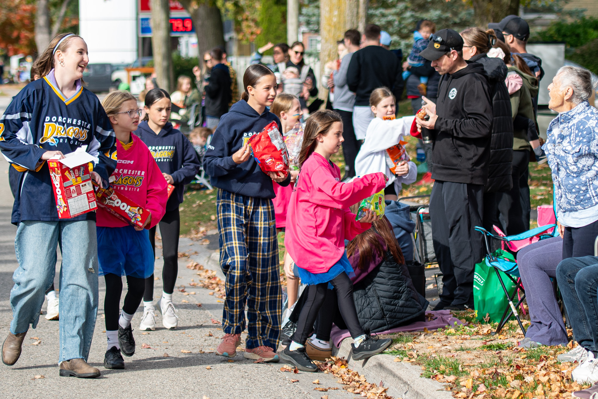 Member of the Dorchester Dragons ringette teams gave out candy along the parade route.