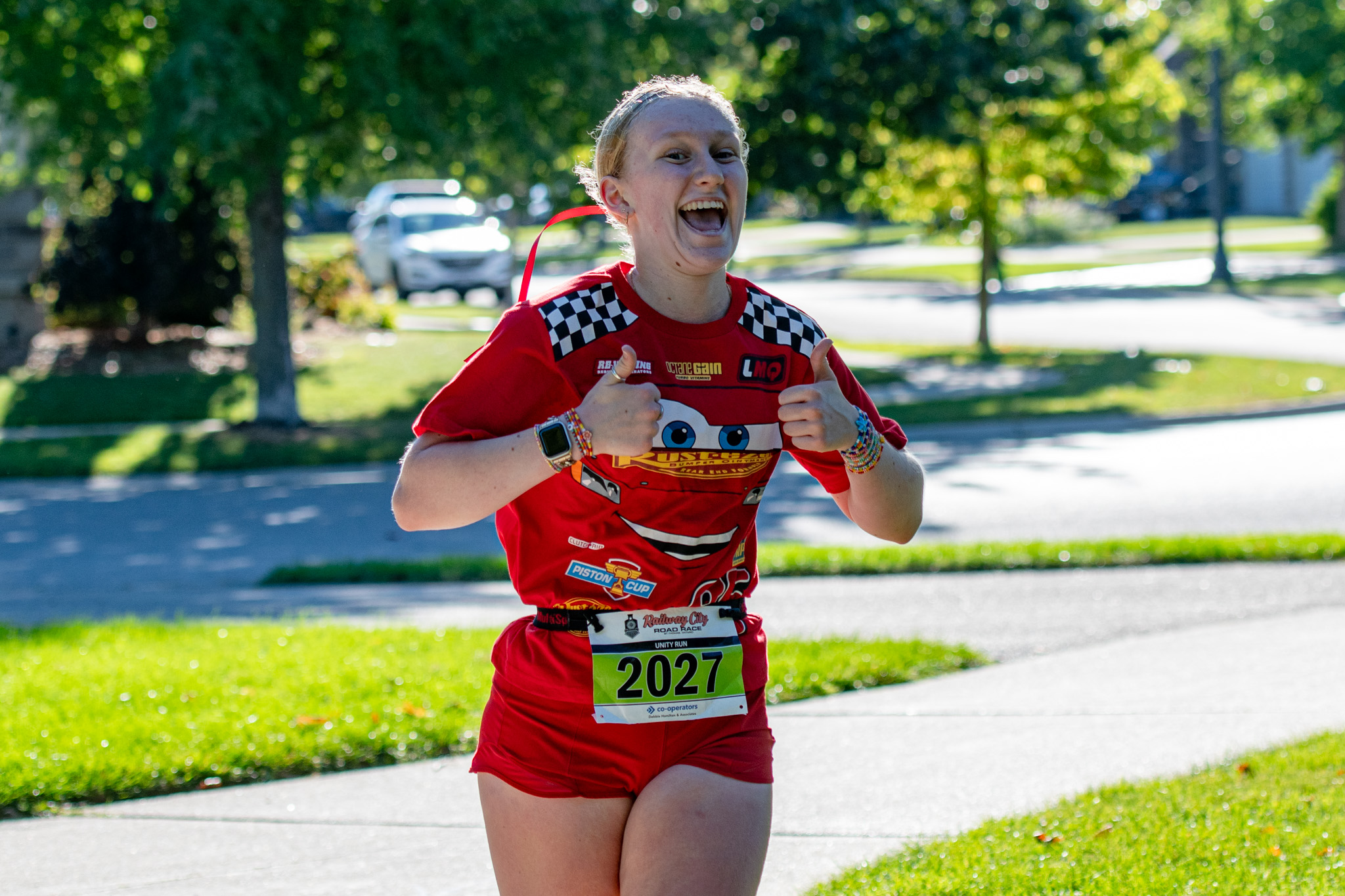 Sarah Robinson channels her inner Lightning McQueen in the 10K.