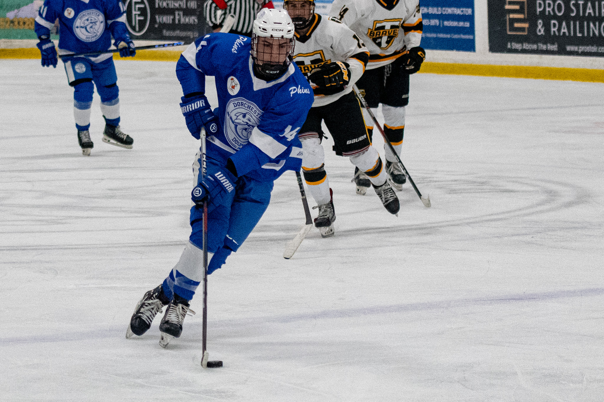 Dorchester Dolphins LJ Legault moves the puck through the neutral zone against Tavistock.