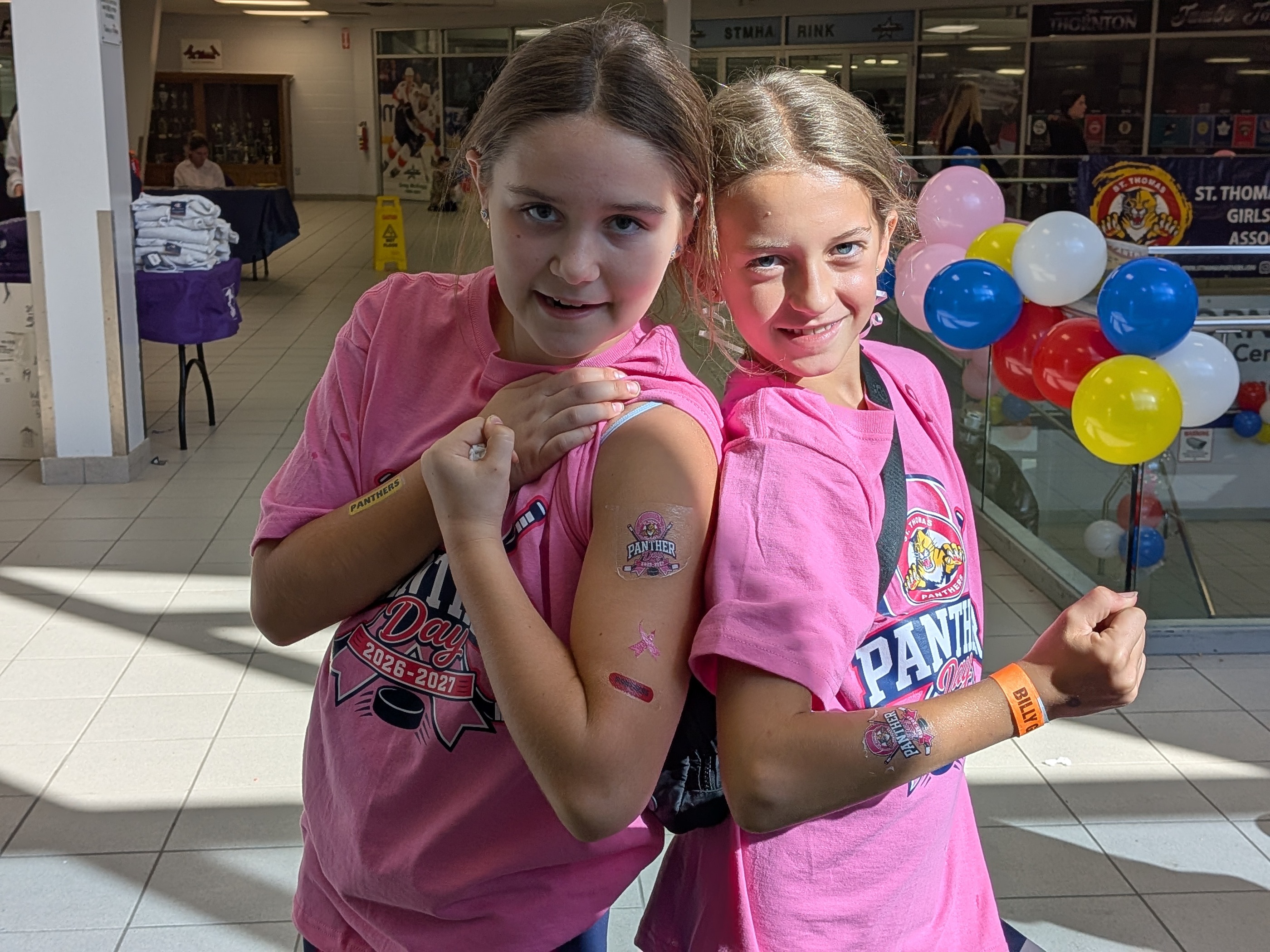 St. Thomas U13A Panthers show off their tattoos.