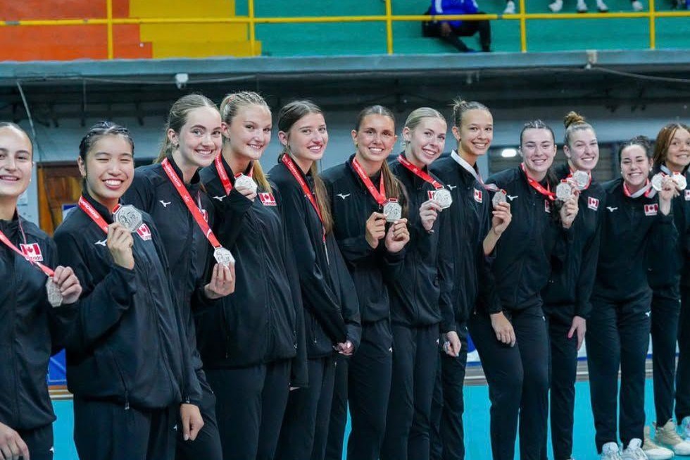 Avery Bradish, seventh from left, during the medal ceremony.