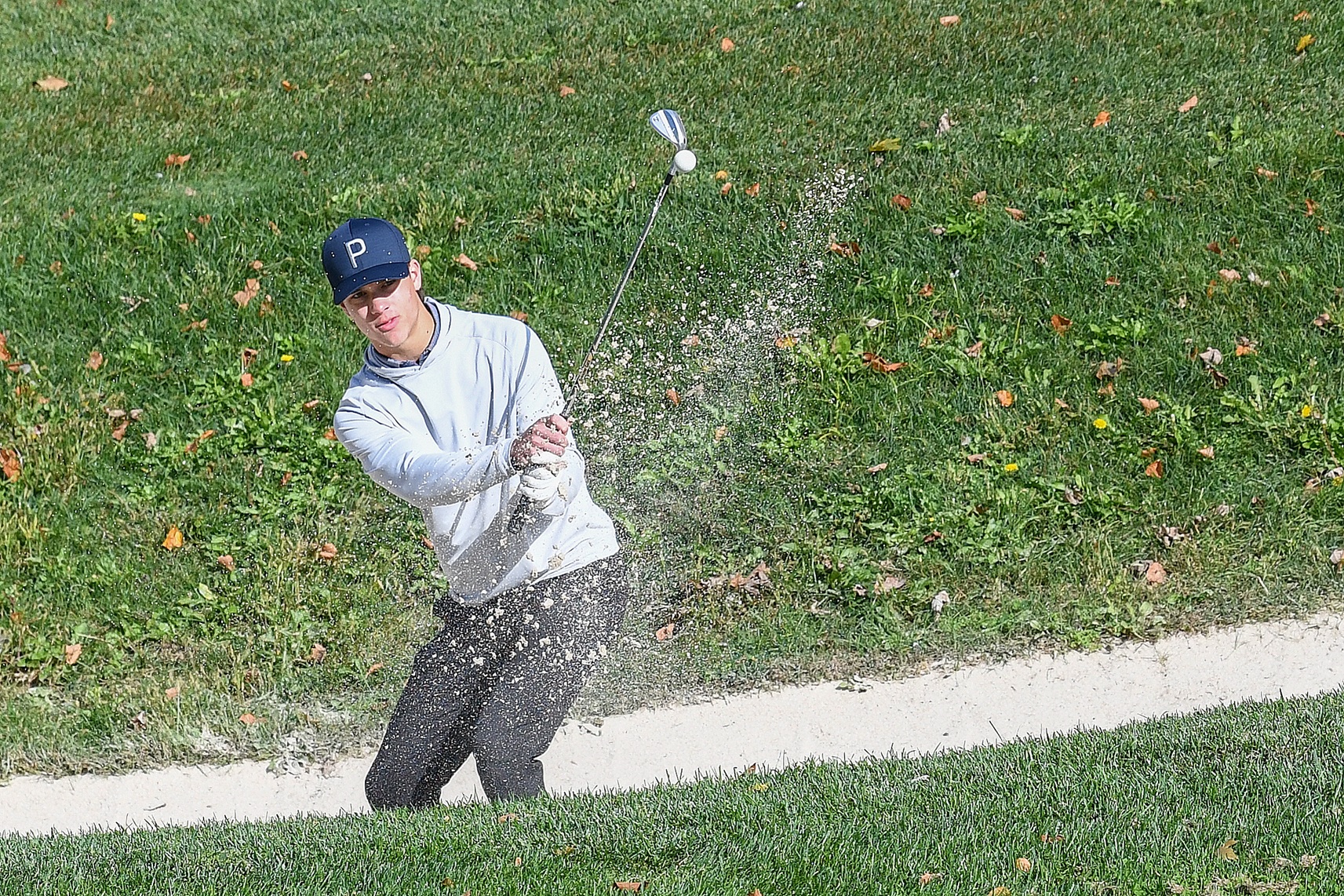 Parskide Stampeders Van McVeigh from the sand bunker.