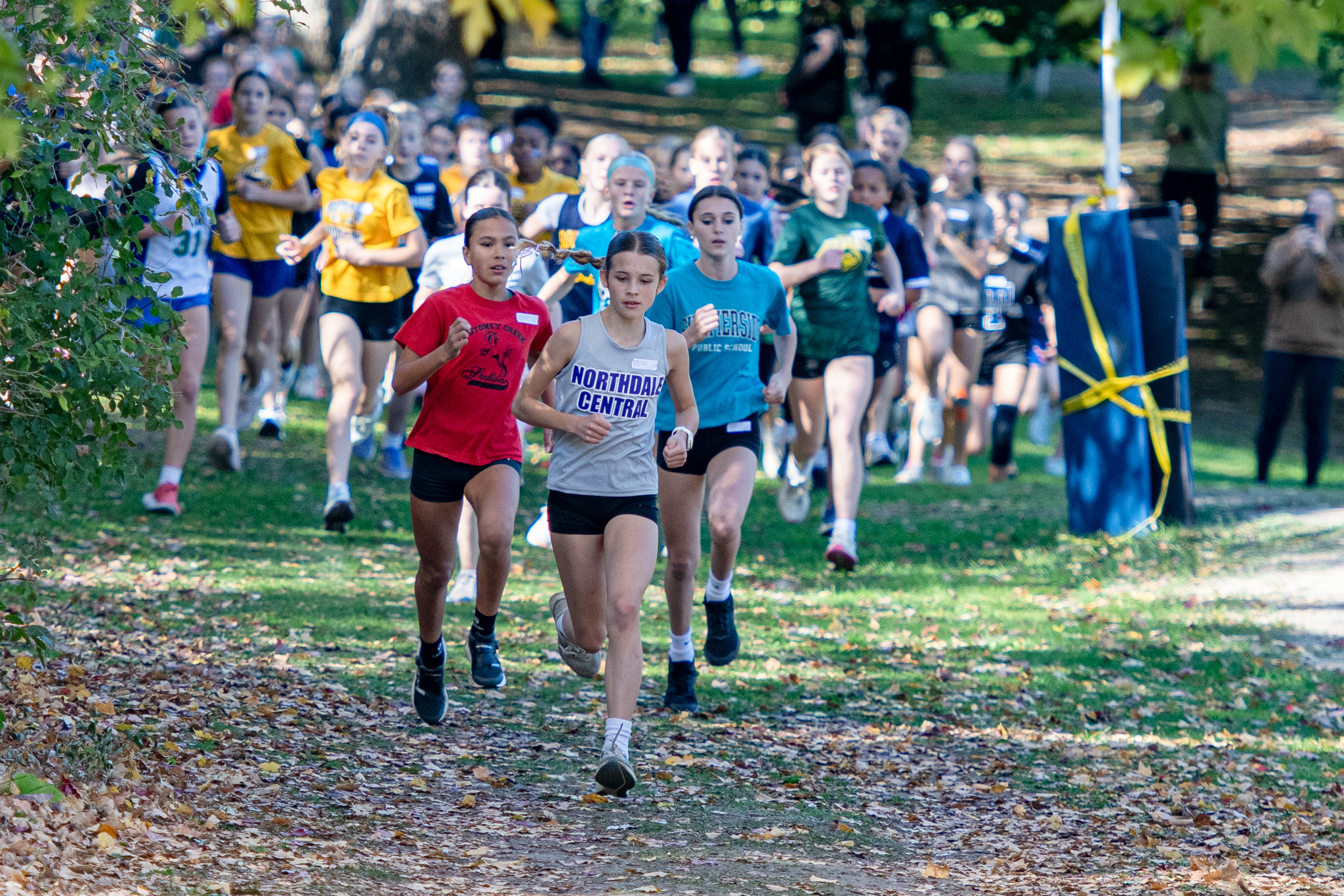 Brooke Samko takes the lead in the opening hundred metres of the senior girls race.