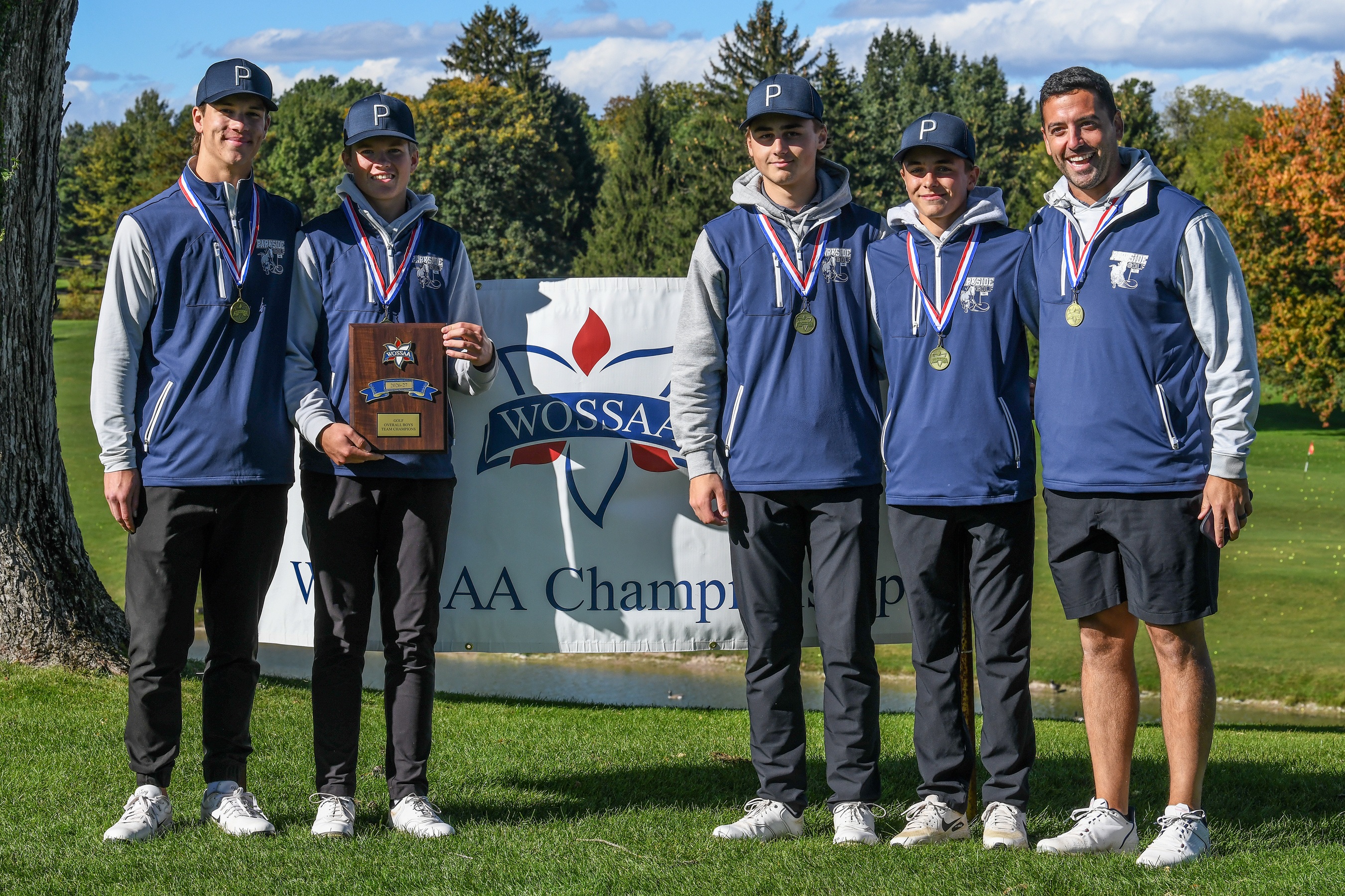 Parkside Stampeders, WOSSAA boys golf team champs are, from left, Van McVeigh, Preston Gryp, Jacob Bosma, Damon Fish, coach Adam Brisson.