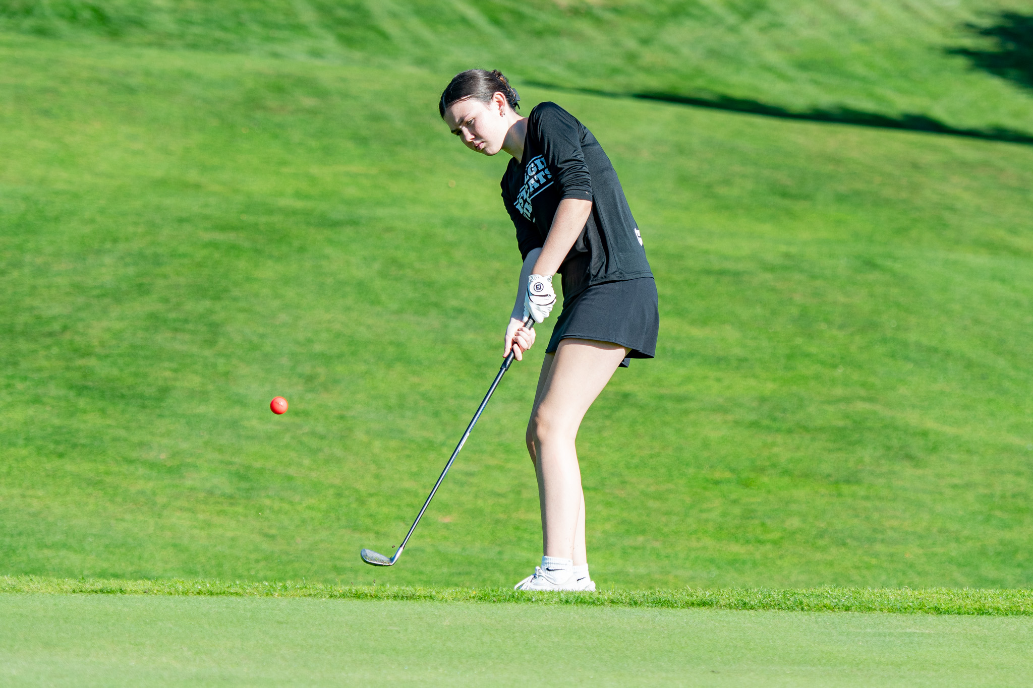 West Elgin Wildcats Nora Gillis putts.