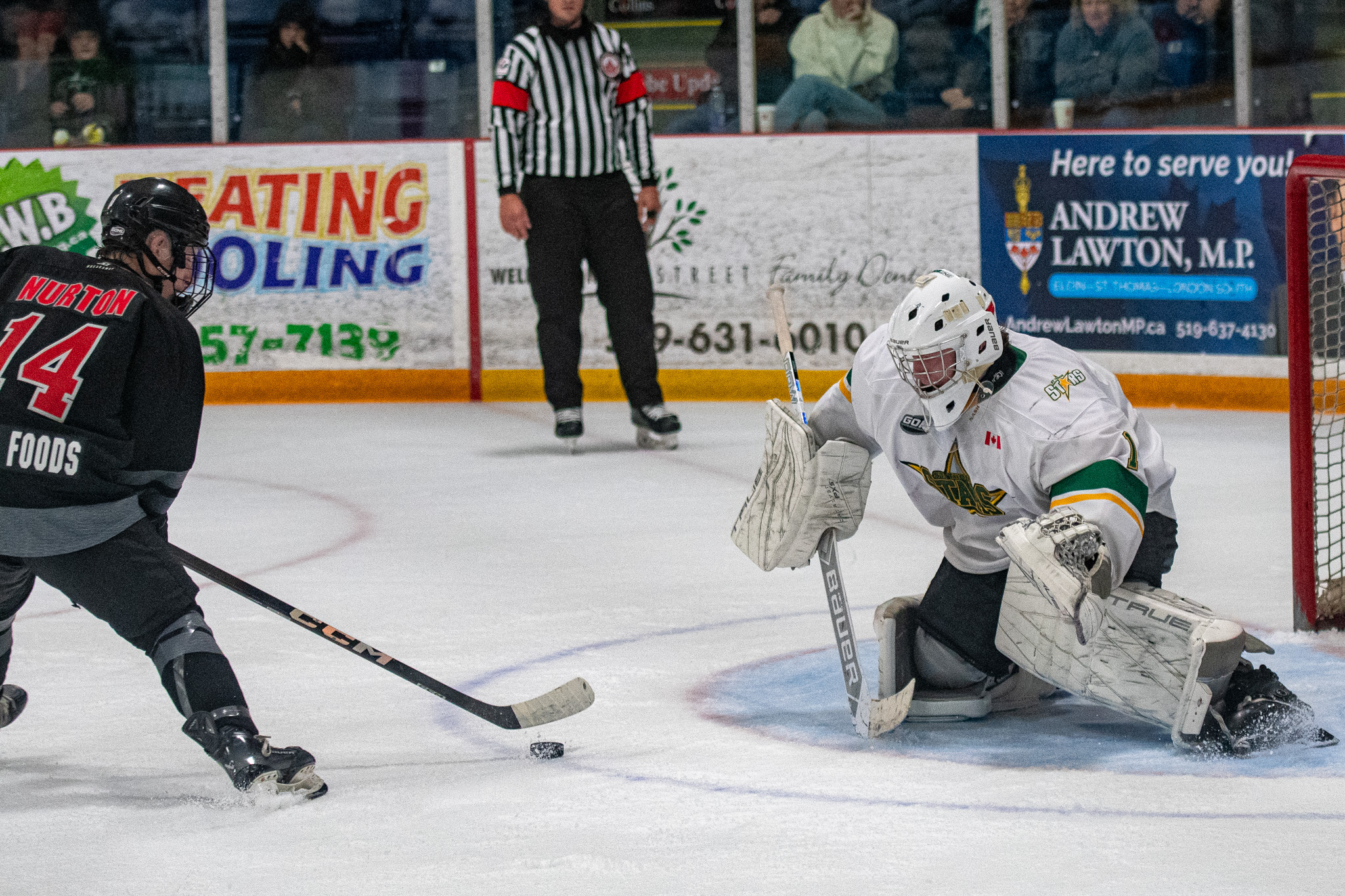 St. Thomas Stars goalie Dylan Durno sets to stop Strathroy Rockets Ian Nurton in the shootout and win the game, 2-1, Friday at the Joe.